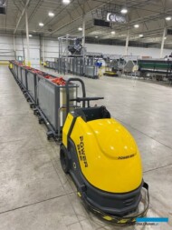 Indukcyjny transport wewnętrzny - wózki z papryką ciągnięte są przez bezobsługowy ciągnik indukcyjny, poruszający się wzdłuż drutu zatopionego w posadzce